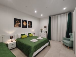 Camera da letto dell’appartamento Le Popolari a Bitonto